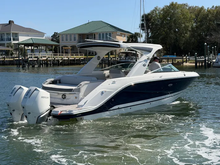  Yacht Photos Pics 2024 Sea Ray SLX 310 Outboard on water, luxury design.