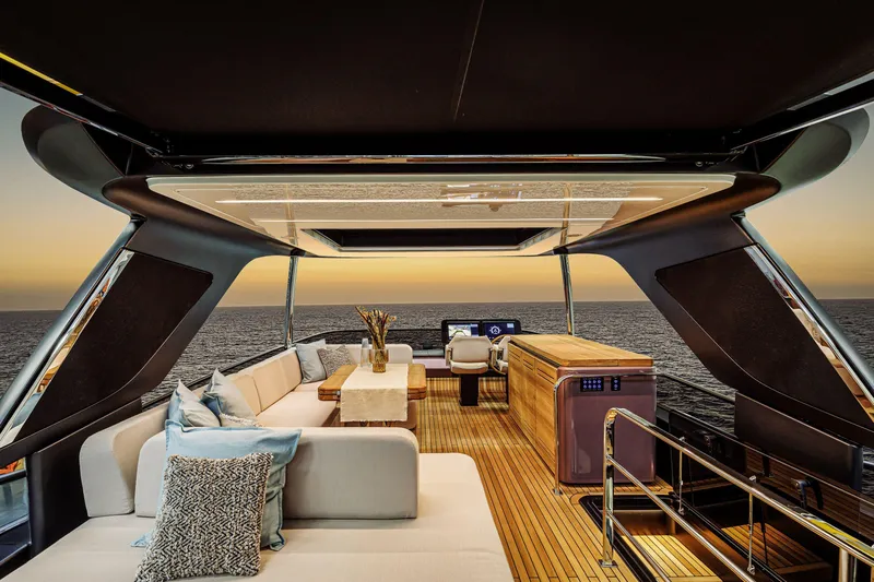  Yacht Photos Pics Luxurious 2026 Cranchi Sessantadue 62 yacht interior with elegant seating and ocean view.