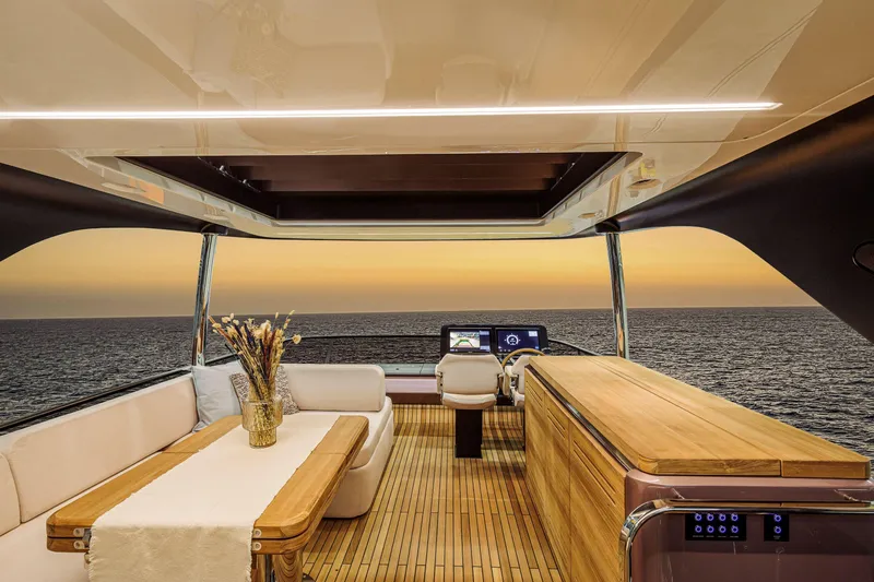  Yacht Photos Pics Luxurious 2026 Cranchi Sessantadue 62 yacht interior with ocean sunset view.