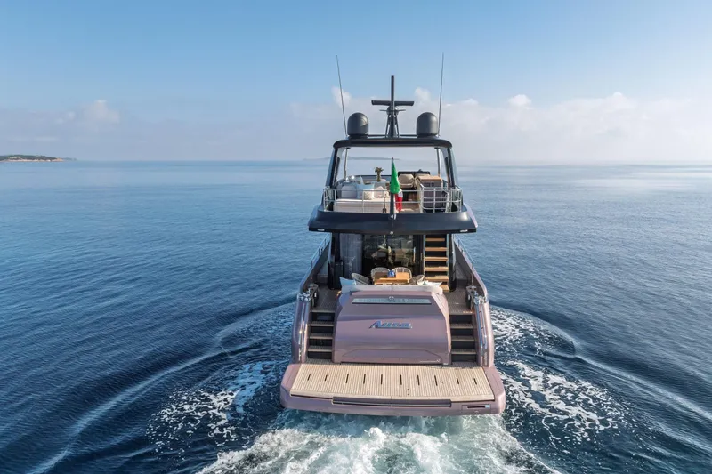  Yacht Photos Pics 2026 Cranchi Sessantadue 62 yacht cruising on calm blue waters.