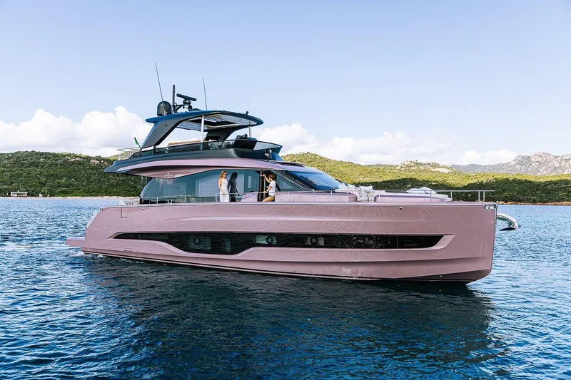  Yacht Photos Pics 2026 Cranchi Sessantadue 62 yacht cruising on serene blue waters.