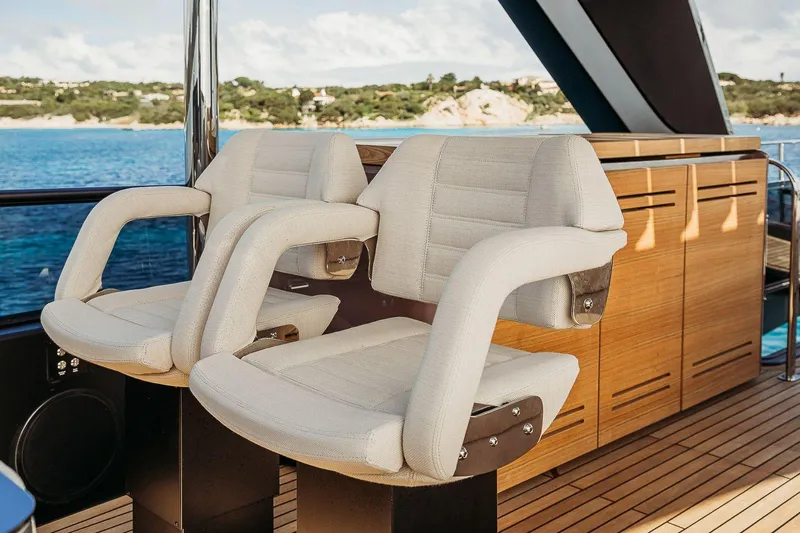  Yacht Photos Pics Luxury seating on 2026 Cranchi Sessantadue 62 yacht with ocean view.