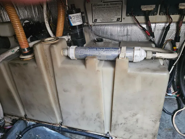  Yacht Photos Pics Engine compartment of 2005 Four Winns 378 Vista boat showing fuel tank and vent filter.