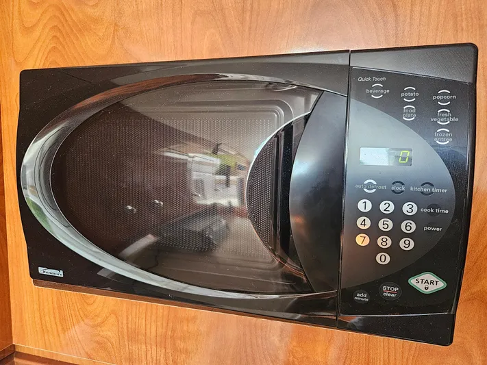  Yacht Photos Pics Built-in microwave in 2005 Four Winns 378 Vista boat kitchen.