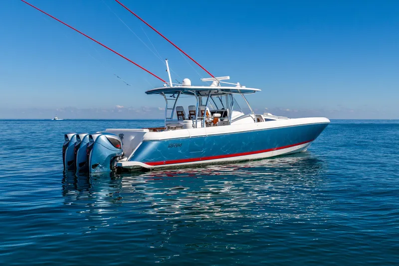  Yacht Photos Pics 2015 Intrepid 475 Panacea boat on calm blue ocean waters.