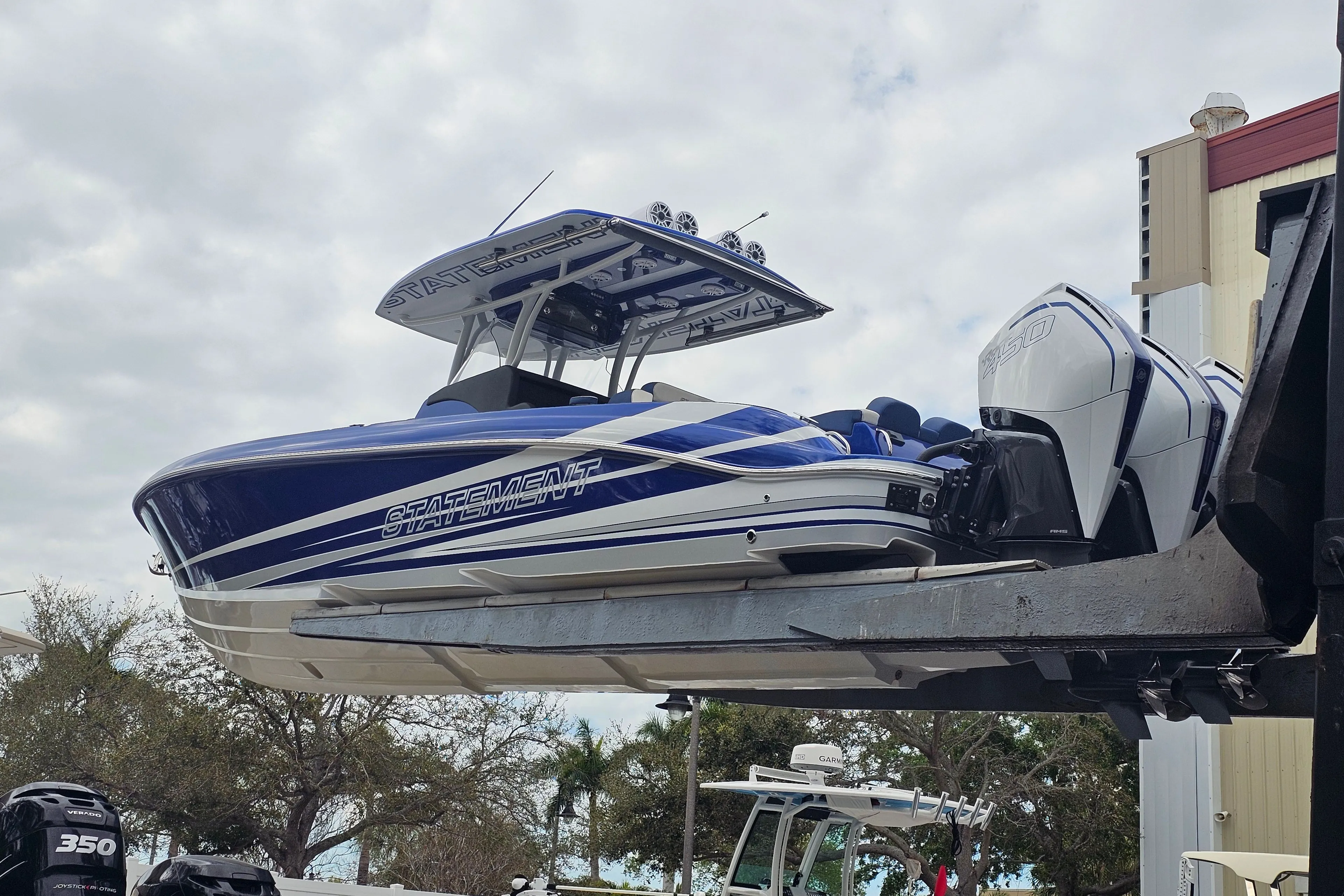 2022 Statement 380 Open boat with powerful outboard engines.