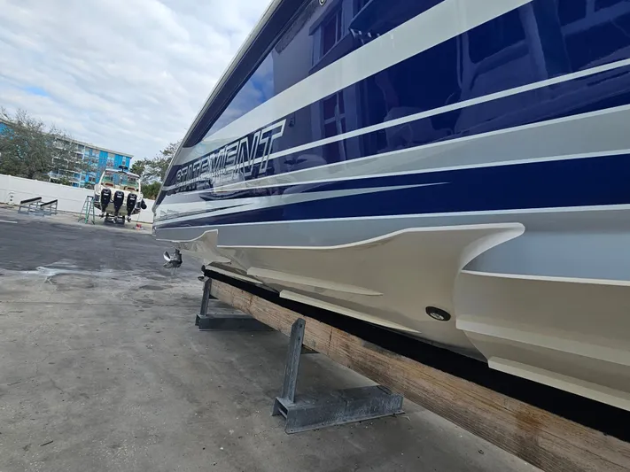  Yacht Photos Pics Statement 380 Open 2022 boat on a trailer, side view.