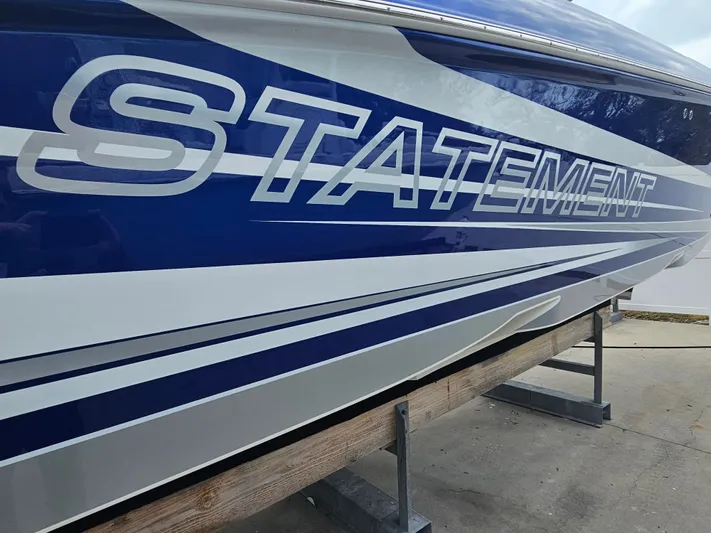  Yacht Photos Pics 2022 Statement 380 Open boat with blue and white paint.