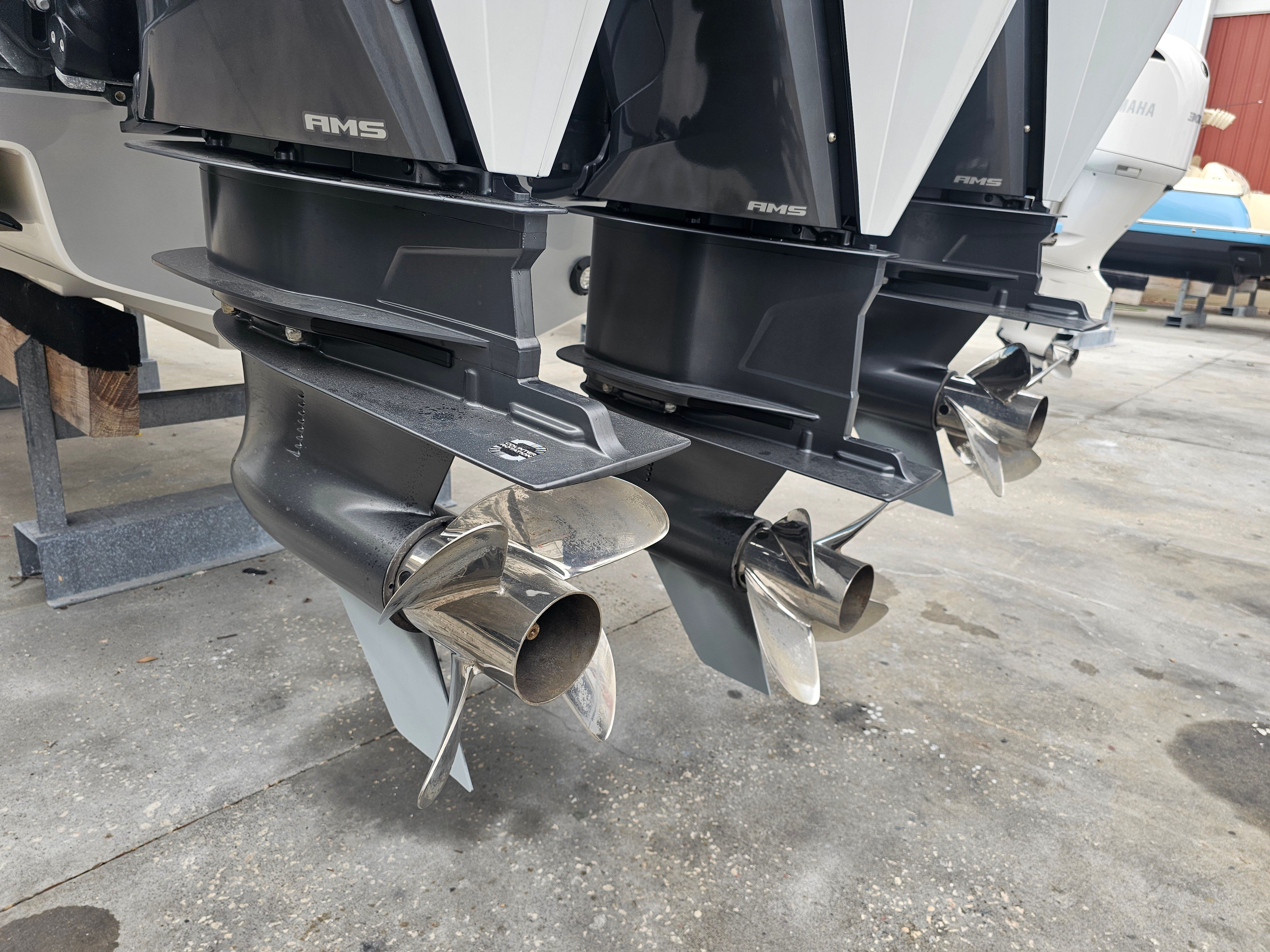 Triple engines of 2022 Statement 380 Open with stainless steel propellers.