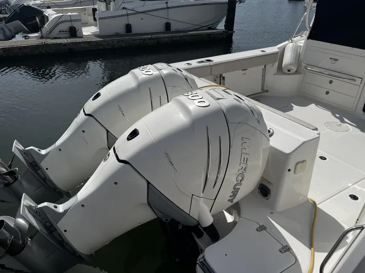  Yacht Photos Pics 2017 Boston Whaler 315 Conquest with twin Mercury outboard engines docked at marina.
