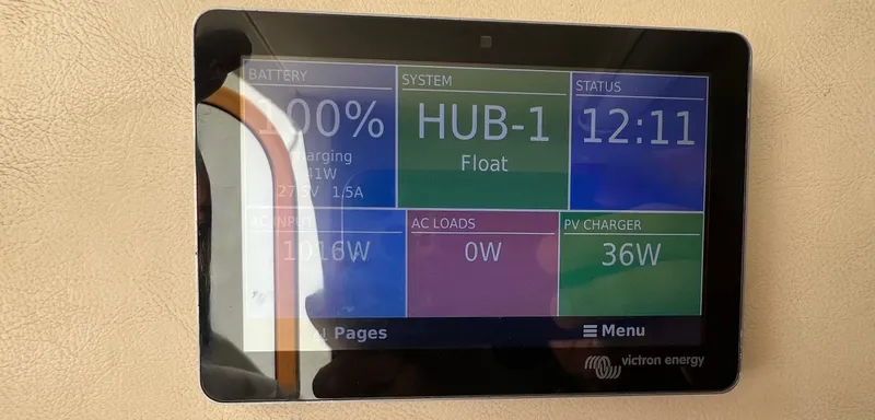 1691 Yacht Photos Pics Touchscreen display showing battery status, system hub, and power usage on a Princess V65 yacht.