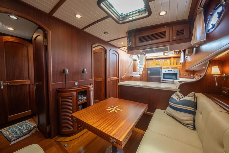 Dreadnought Yacht Photos Pics Luxurious 2007 Vicem 65 yacht interior with elegant wood finishes and modern kitchen amenities.