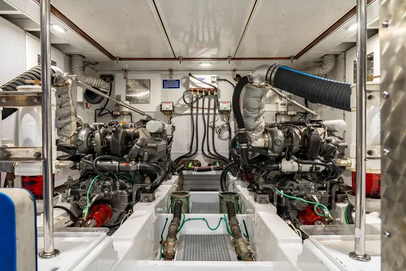 Dreadnought Yacht Photos Pics Engine room of a 2007 Vicem 65 yacht, showcasing dual engines and mechanical systems.
