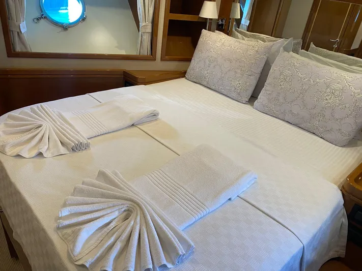  Yacht Photos Pics Luxurious bedroom on 2013 Apreamare Maestro 65 yacht with elegant bedding and decor.