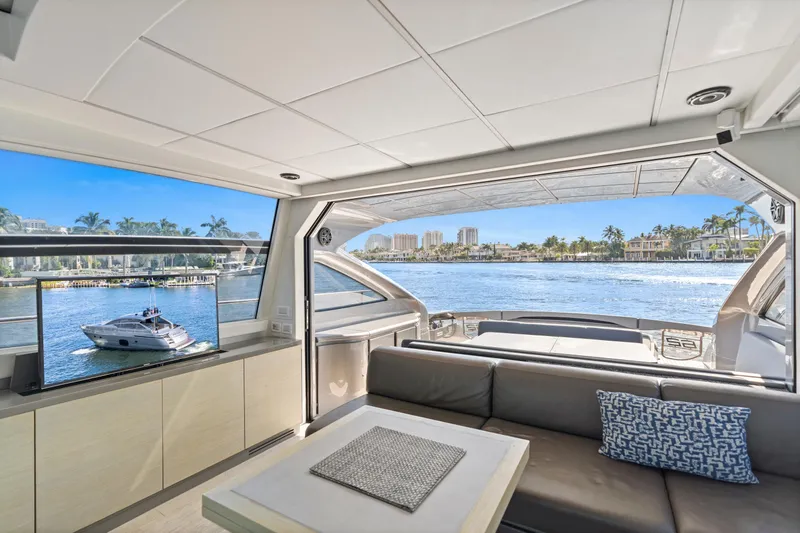  Yacht Photos Pics Luxurious 2016 Pershing 62' yacht interior with waterfront view and modern amenities.