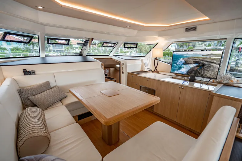 Altair Yacht Photos Pics Luxurious interior of 2019 Aquila 44 Yacht with elegant seating and modern amenities.