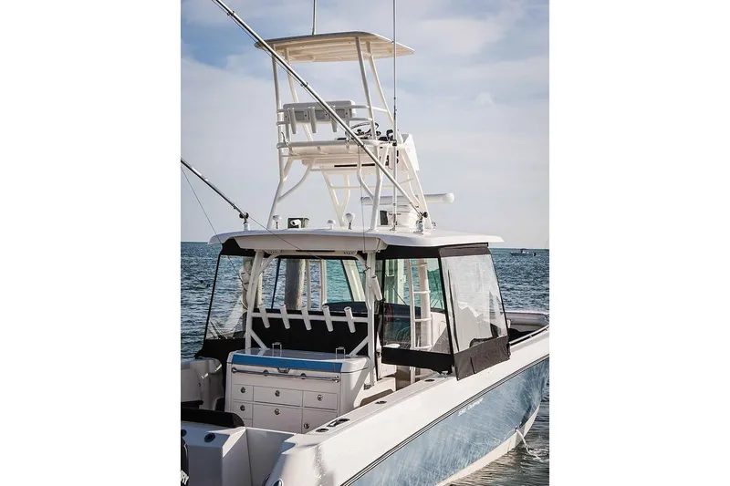  Yacht Photos Pics Manufacturer Provided Image: 2020 Boston Whaler 350 Outrage boat on the water, rear view.
