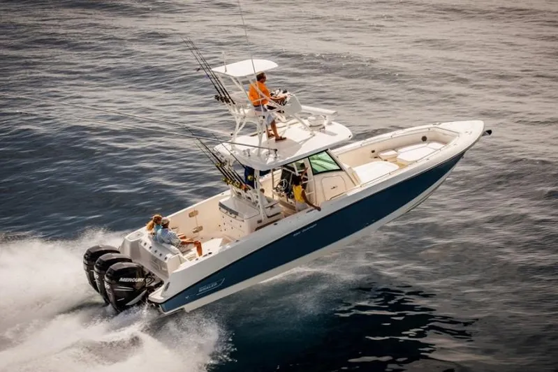  Yacht Photos Pics Manufacturer Provided Image: 2020 Boston Whaler 350 Outrage speeding on open water.