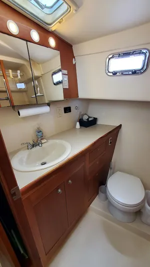 Pura Vida Yacht Photos Pics Guest Head Vanity and Toilet
