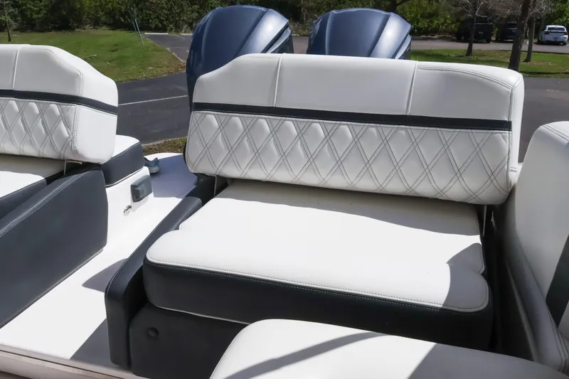  Yacht Photos Pics 2019 Regal 29 OBX boat interior with white diamond-stitched seating.