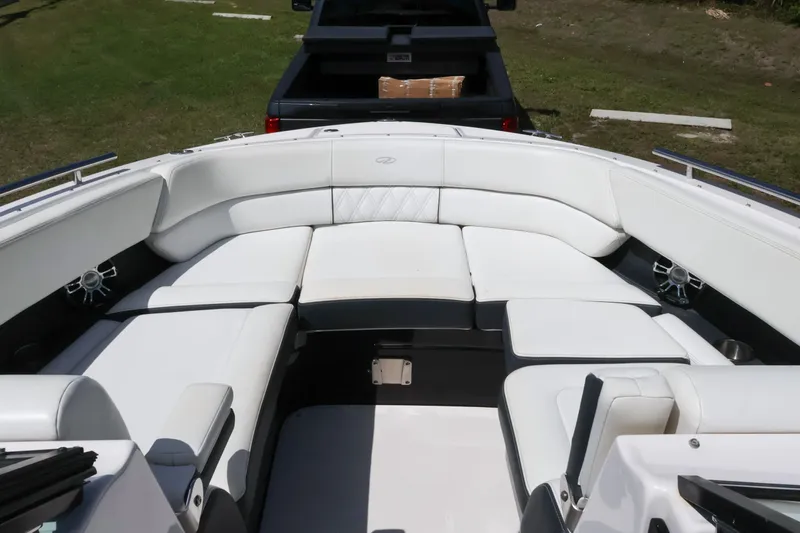  Yacht Photos Pics 2019 Regal 29 OBX boat interior with white seating and speakers.
