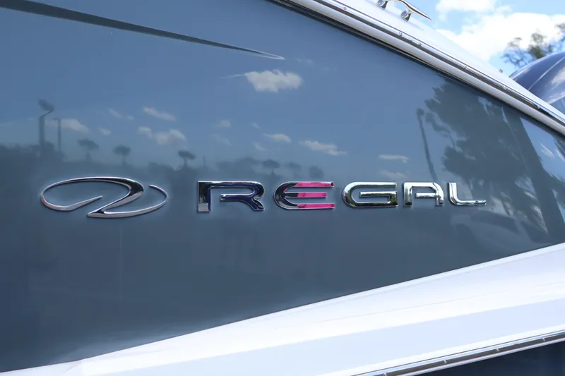  Yacht Photos Pics 2019 Regal 29 OBX boat logo on sleek gray surface.