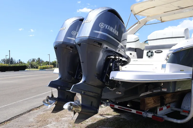  Yacht Photos Pics 2019 Regal 29 OBX boat with dual Yamaha outboard engines on a trailer.