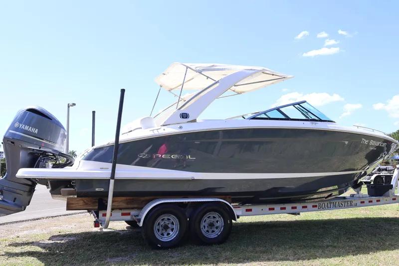  Yacht Photos Pics 2019 Regal 29 OBX boat on trailer with Yamaha outboard motor.