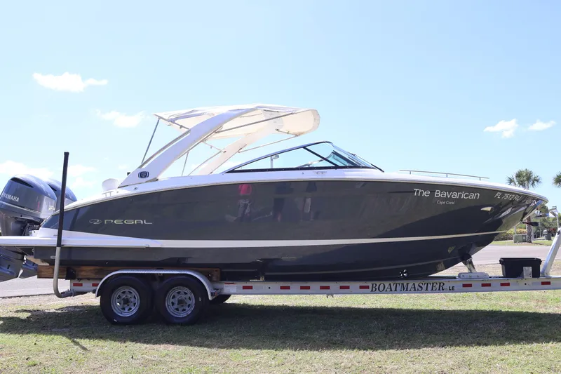 Yacht Photos Pics 2019 Regal 29 OBX boat on trailer, side view, with Yamaha engines.
