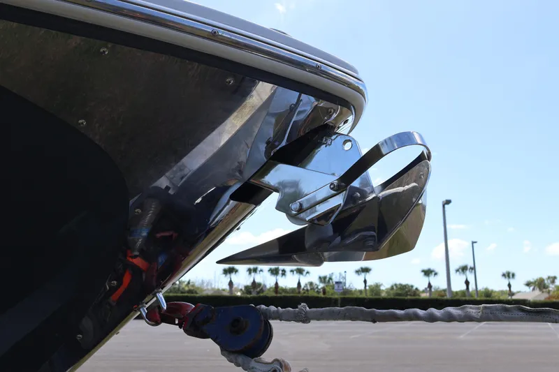  Yacht Photos Pics Close-up of 2019 Regal 29 OBX boat anchor against a clear sky.