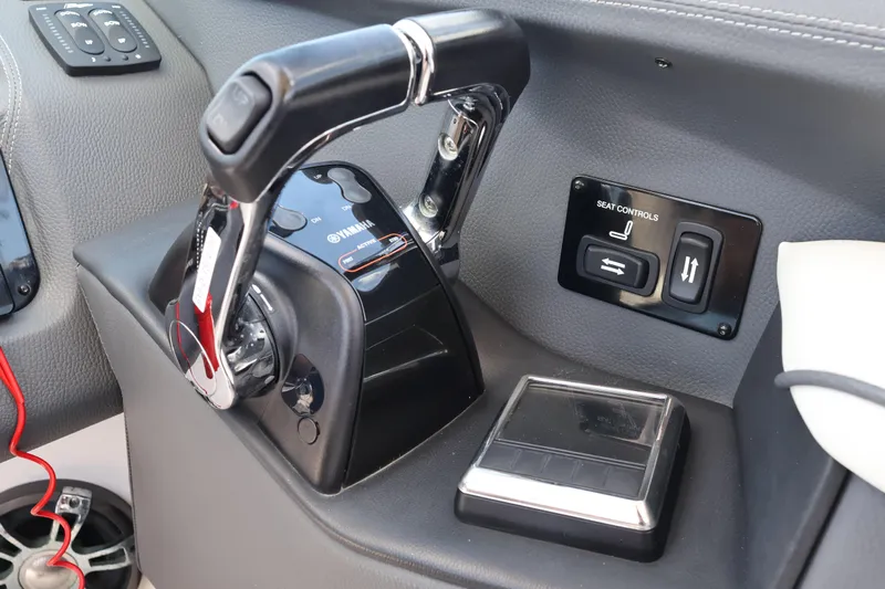  Yacht Photos Pics Control panel of a 2019 Regal 29 OBX boat with Yamaha throttle and seat controls.