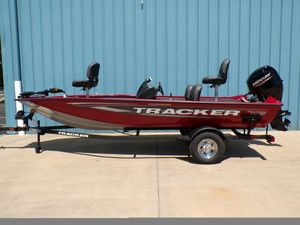 2025 Tracker Pro Team 175 TF® boat, red, on trailer, side view.