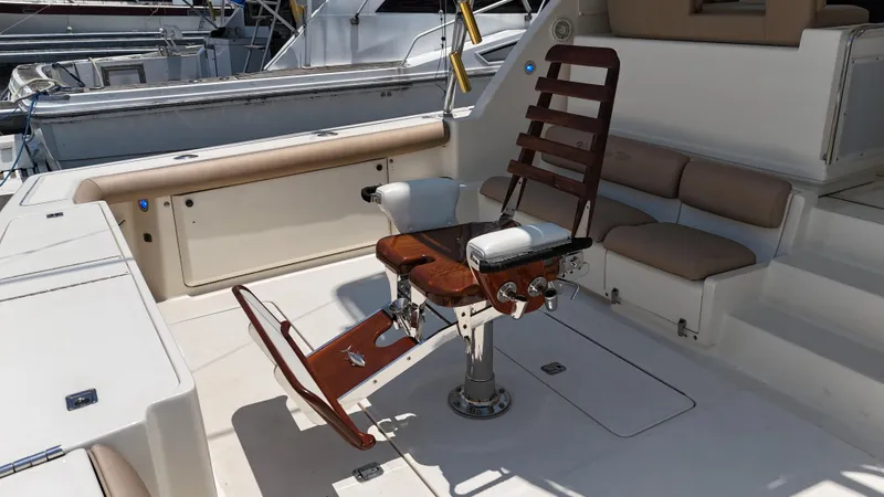 Hoggtide Two Yacht Photos Pics 1998 Tiara Yachts 4100 Open fishing chair and cockpit area.