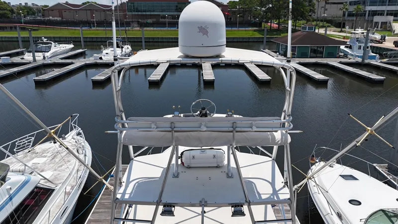 Hoggtide Two Yacht Photos Pics 1998 Tiara Yachts 4100 Open docked at a marina, view from the upper deck.