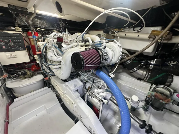 Hoggtide Two Yacht Photos Pics Engine room of 1998 Tiara Yachts 4100 Open, showcasing detailed mechanical components.