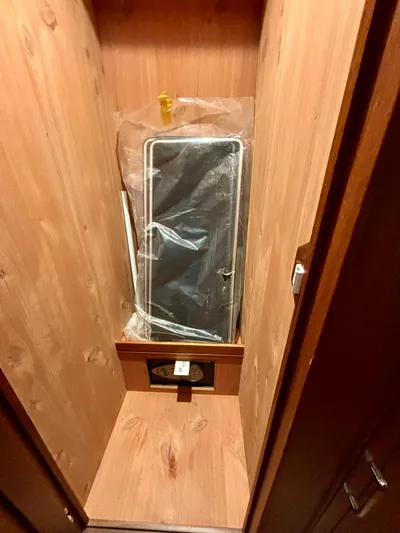 Forever Fun Yacht Photos Pics Wooden storage compartment in a 2018 Marlow 53E CB yacht.