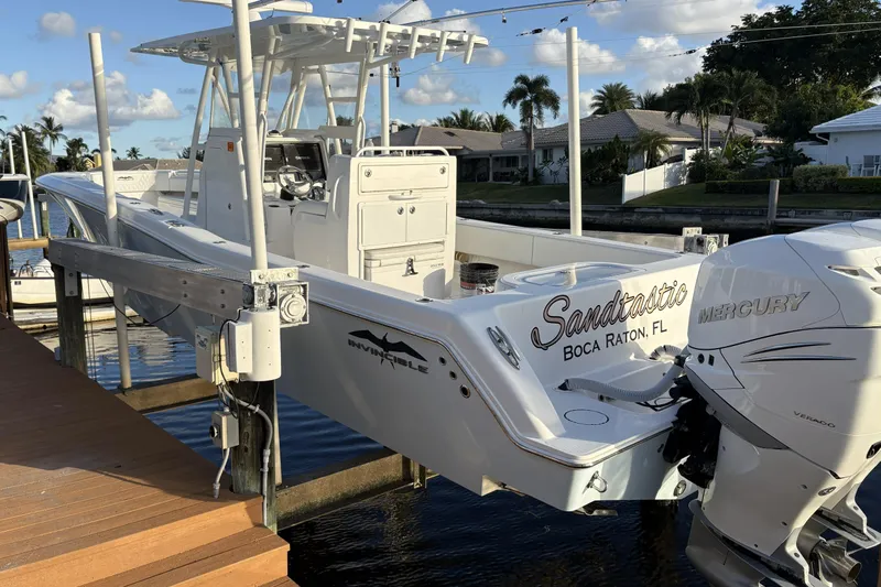 Sandtastic Yacht Photos Pics 2020 Invincible 33 Open Fisherman boat docked, featuring Mercury engines, in Boca Raton, FL.