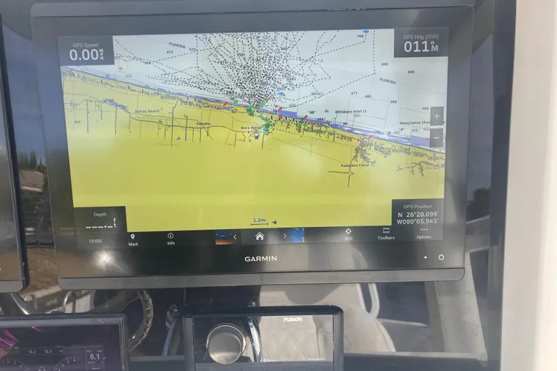 Sandtastic Yacht Photos Pics Garmin GPS display on 2020 Invincible 33 Open Fisherman boat, showing navigation map.