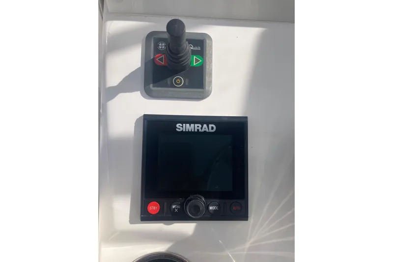 Sandtastic Yacht Photos Pics Control panel of 2020 Invincible 33 Open Fisherman with Simrad display and joystick.