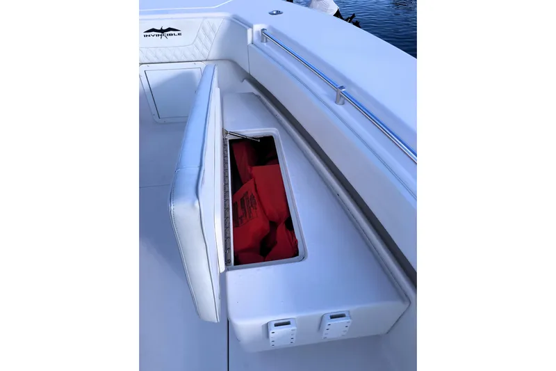 Sandtastic Yacht Photos Pics 2020 Invincible 33 Open Fisherman boat with open storage compartment.