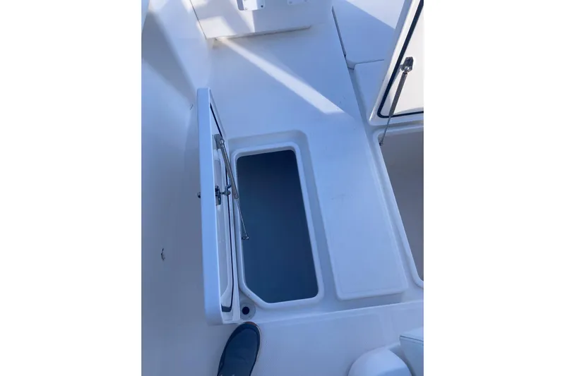 Sandtastic Yacht Photos Pics 2020 Invincible 33 Open Fisherman boat deck with open storage compartment.