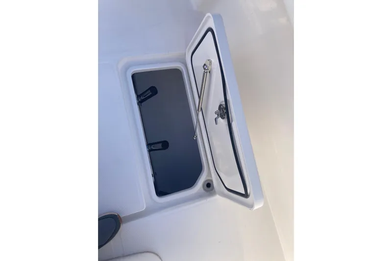 Sandtastic Yacht Photos Pics Open storage compartment on 2020 Invincible 33 Open Fisherman boat.