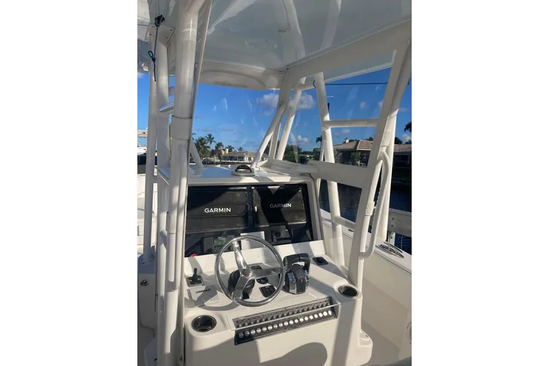 Sandtastic Yacht Photos Pics 2020 Invincible 33 Open Fisherman boat console with Garmin navigation system.