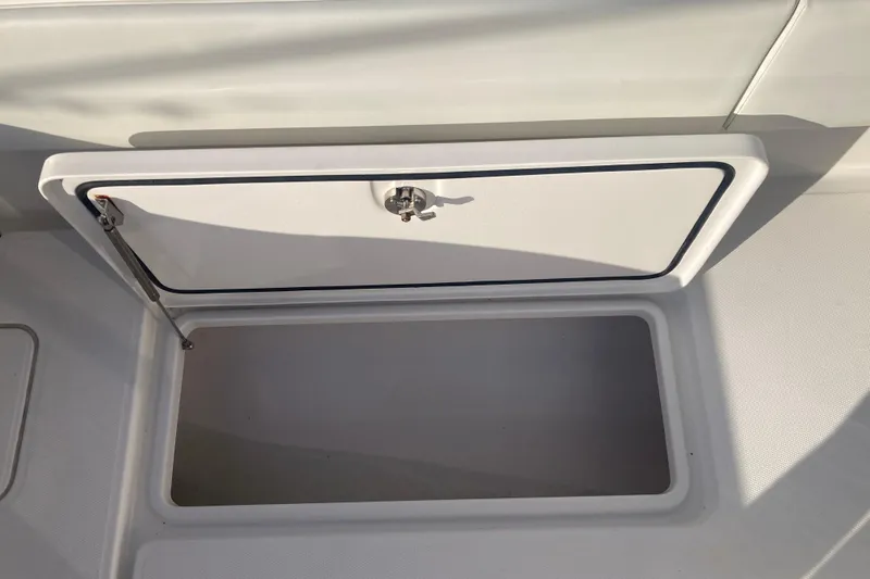 Sandtastic Yacht Photos Pics Open storage compartment on 2020 Invincible 33 Open Fisherman boat.
