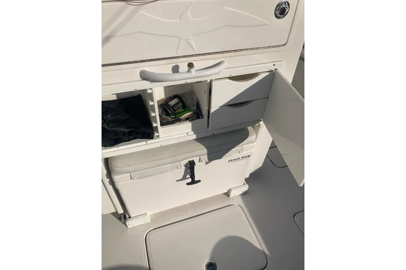 Sandtastic Yacht Photos Pics 2020 Invincible 33 Open Fisherman boat storage compartments and cooler.
