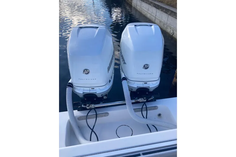 Sandtastic Yacht Photos Pics Twin outboard engines on a 2020 Invincible 33 Open Fisherman boat.