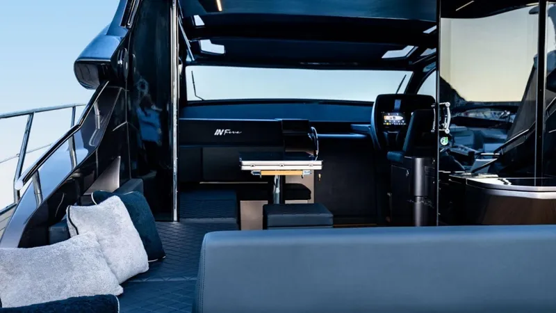  Yacht Photos Pics Luxury interior of 2024 Rizzardi In Five yacht with modern seating and helm.