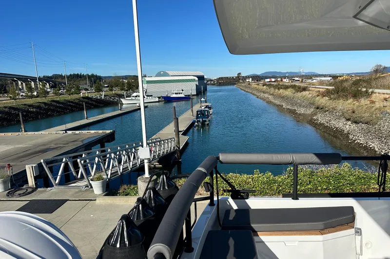  Yacht Photos Pics View from Sargo 31OB 2025 boat overlooking marina and waterway on a sunny day.