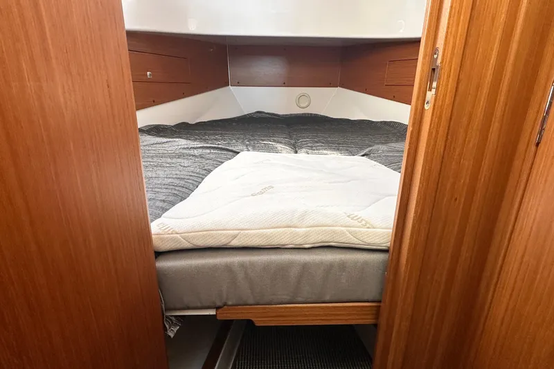  Yacht Photos Pics Cozy cabin interior of 2025 Sargo 31OB boat with comfortable bedding.