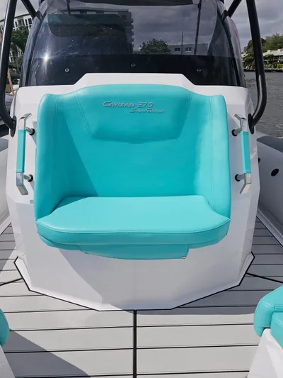  Yacht Photos Pics 2025 Ranieri CAYMAN 27.0 SPORT TOURING boat with turquoise seating.